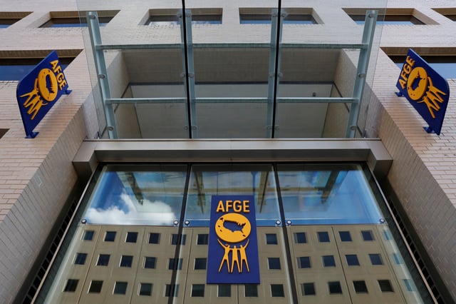 The logo of the American Federation of Government Employees (AFGE) is seen on the outside of their headquarters in Washington, D.C., U.S., August 30, 2020. REUTERS/Andrew Kelly/File Photo