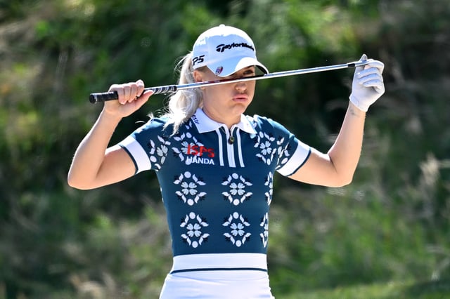 EVIAN-LES-BAINS, FRANCE - JULY 10: Charley Hull of England reacts as she prepares to play a shot on the third hole during Round One of The Amundi Evian Championship 2025 at Evian Resort Golf Club on July 10, 2025 in Evian-les-Bains, France. (Photo by Stuart Franklin/Getty Images)