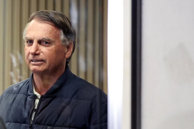 Former Brazilian President Jair Bolsonaro leaves the Liberal Party headquarters in Brasilia, Brazil, July 23, 2025. REUTERS/Adriano Machado/File Photo