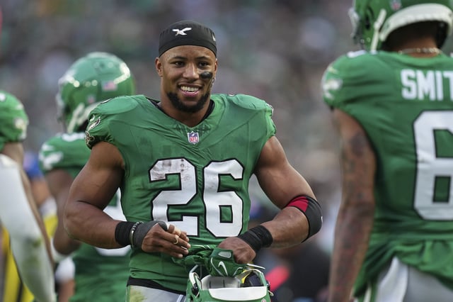 Saquon Barkley #26 of the Philadelphia Eagles reacts against the Dallas Cowboys at Lincoln Financial Field on December 29, 2024 in Philadelphia, Pennsylvania.