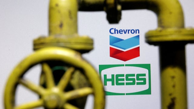 Chevron and Hess logos are seen in this illustration taken, October 23, 2023. REUTERS/Dado Ruvic/Illustration/File Photo/File Photo