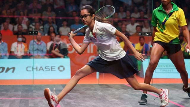 BIRMINGHAM, ENGLAND - JULY 29: Anahat Singh of Team India plays a shot against Jada Ross of Team Saint Vincent and the Grenadines during the Men's/Women's Singles Round of 64 Match on day one of the Birmingham 2022 Commonwealth Games at University of Birmingham Hockey & Squash Centre on July 29, 2022 on the Birmingham, England. (Photo by Eddie Keogh/Getty Images) (Getty Images)