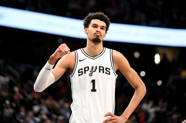 Victor Wembanyama #1 of the San Antonio Spurs celebrates after a 131-121 victory against the Washington Wizards at Capital One Arena on February 10, 2025 in Washington, DC.