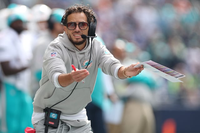 Head coach Mike McDaniel of the Miami Dolphins calls a timeout during the first quarter against the Seattle Seahawks at Lumen Field on September 22, 2024 in Seattle, Washington.