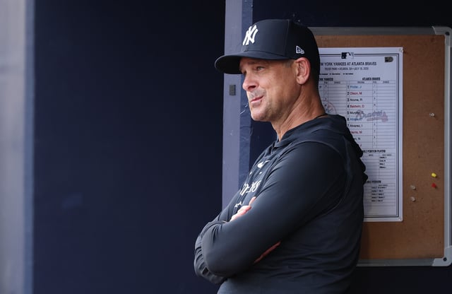 ATLANTA, GEORGIA - JULY 19: Manager Aaron Boone #17 of the New York Yankees looks on prior to facing the Atlanta Braves at Truist Park on July 19, 2025 in Atlanta, Georgia.