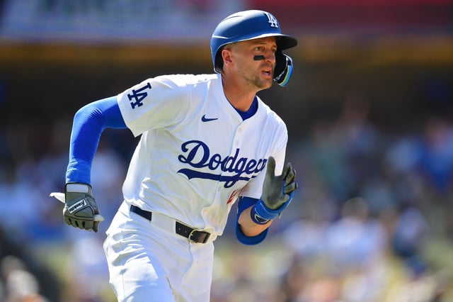 Jul 25, 2024; Los Angeles, California, USA; Los Angeles Dodgers shortstop Nick Ahmed (12) runs after hitting a solo home run against the San Francisco Giants during the eighth inning at Dodger Stadium. Mandatory Credit: Gary A. Vasquez-USA TODAY Sports/File Photo