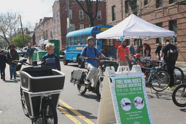 People enjoy an open streets event in Queens in celebration of Earth Day on April 20, 2024.