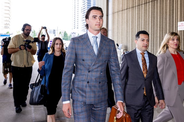 Alex Formenton arrives at court as a judge prepares to announce the verdict in the trial against five teammates from Canada’s 2018 gold medal–winning world junior hockey team, charged with sexually assaulting a woman in a hotel room, at the Superior Court of Justice in London, Ontario, Canada, July 24, 2025. REUTERS/Carlos Osorio