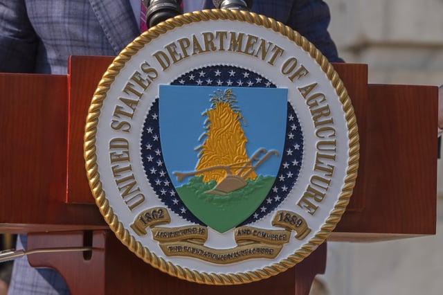 FILE - The U.S. Department of Agriculture seal is seen on a podium during a news conference in Washington, July 8, 2025. (AP Photo/Manuel Balce Ceneta, File)