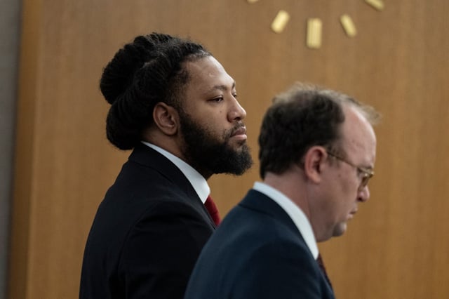 Defendant Derrick John Thompson, left, stands next to his attorney, Tyler Bliss, as he is pronounced guilty on all counts in his criminal trial at the Hennepin County Government Center in Minneapolis on Friday, June 6, 2025. A jury found Thompson guilty on five counts of third-degree murder and 10 counts of criminal vehicular homicide for the deaths of five young women in a Minneapolis car crash in June 2023. (Aaron Nesheim / Sahan Journal)