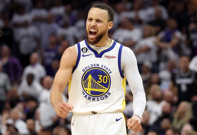 Stephen Curry #30 of the Golden State Warriors celebrates during the third quarter in game seven of the Western Conference First Round Playoffs against the Sacramento Kings at Golden 1 Center on April 30, 2023 in Sacramento, California.