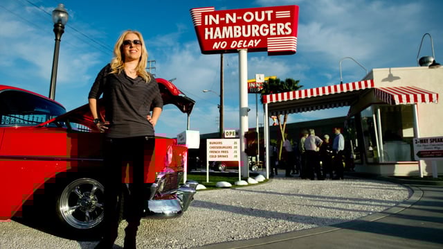 In-N-Out Burger’s owner and president Lynsi Synder visits a replica of the chain’s first drive-thru in Baldwin Park on Tuesday, Feb. 26, 2014. (Photo by Watchara Phomicinda, San Gabriel Valley Tribune/SCNG)