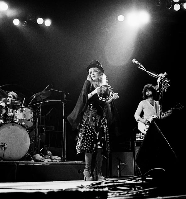 From left: Fleetwood, Nicks and Buckingham perform together in 1975. Nicks was already starting to hone her witchy onstage persona.