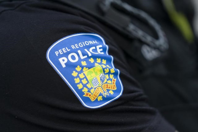 A Peel police shoulder patch is seen in Mississauga, Ont., on Saturday, July 1, 2023. Police say they believe a series of shootings and three homicides in the Greater Toronto Area last November are connected and they're asking for the public's help to identify the suspects. THE CANADIAN PRESS/Arlyn McAdorey