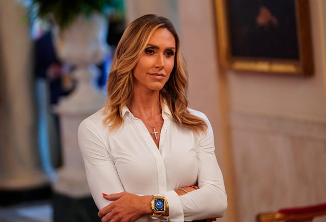 Lara Trump, daughter-in-law of U.S. President Donald Trump, looks on, before President Trump signs the "Genius Act", which will develop regulatory framework for stablecoin cryptocurrencies and expand oversight of the industry, at the White House in Washington, D.C., U.S., July 18, 2025. REUTERS/Nathan Howard/File Photo