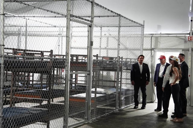 President Donald Trump, Gov. Ron DeSantis, R-Fla., and Homeland Security Secretary Kristi Noem, and others tour &#34;Alligator Alcatraz,&#34; a new detention facility at Dade-Collier Training and Transition facility on Tuesday, July 1, 2025, in Ochopee, Fla. (AP Photo/Evan Vucci)