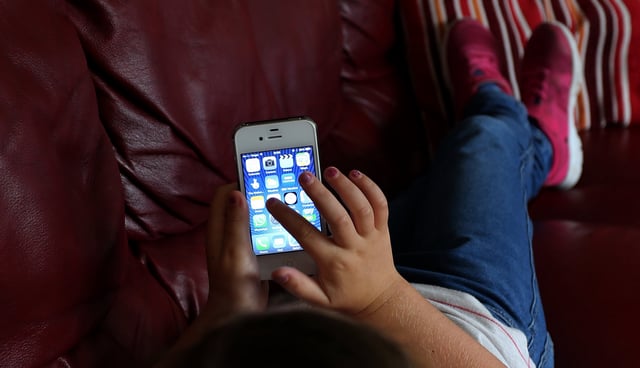 Children will be restricted from accessing material such as pornography and content referencing self-harm, suicide, hate speech, and violence (Photo: Peter Byrne/PA Wire)