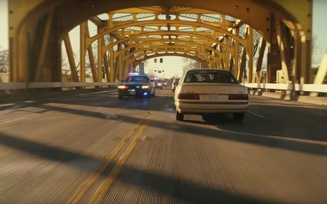 A still of a scene on the Tower Bridge in Sacramento from the upcoming Paul Thomas Anderson film “One Battle After Another.”