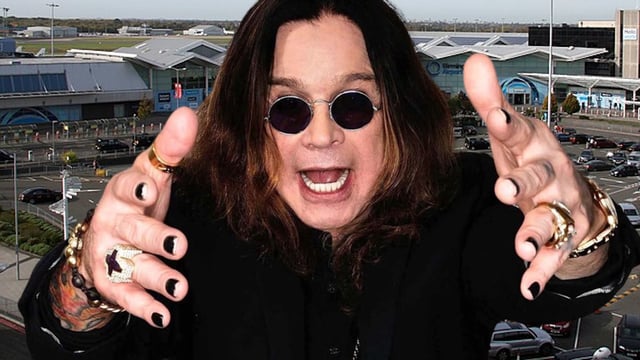 Ozzy Osbourne in front of Birmingham Airport
