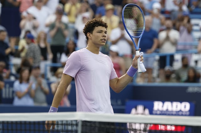 Jul 22, 2025; Washington, D.C., USA; Ben Shelton (USA) salutes the crowd after his match against Mackenzie McDonald (USA)(not pictured) in a men's singles match on day two of the Mubadala Citi DC Open at Rock Creek Park Tennis Center. Mandatory Credit: Geoff Burke-Imagn Images/File Photo
