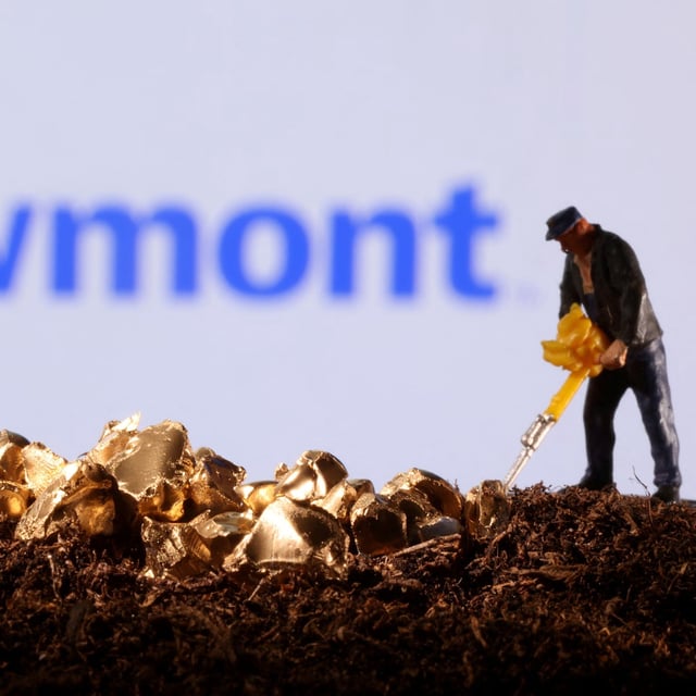 FILE PHOTO: A small toy figure and gold imitation are seen in front of the Newmont logo in this illustration taken November 19, 2021. REUTERS/Dado Ruvic/Illustration/File Photo