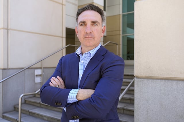 Former federal prosecutor Michael Gordon poses for a photo outside the Sam Gibbons United States Courthouse, Thursday, July 24, 2025, in Tampa, Fla. (AP Photo/Chris O'Meara)