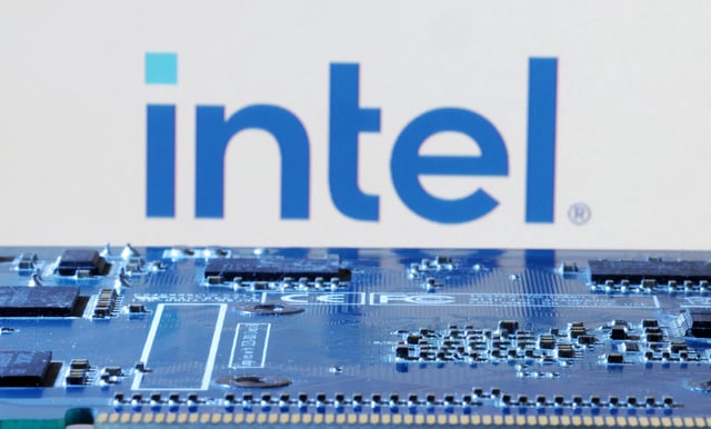 Intel logo is seen near computer motherboard in this illustration taken January 8, 2024. REUTERS/Dado Ruvic/Illustration/ File Photo