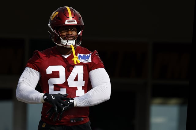 Jul 23, 2025; Ashburn, VA, USA; Washington Commanders outside linebacker Von Miller (24) walks out of team headquarters onto the fields prior to practice on day one of training camp at OrthoVirginia Training Center at Commanders Park. Mandatory Credit: Geoff Burke-Imagn Images/File Photo