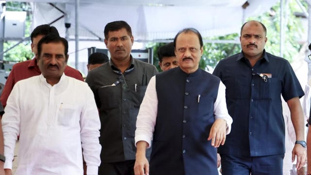 Mumbai: Maharashtra Deputy Chief Minister Ajit Pawar and others arrive at the Vidhan Bhavan for the Monsoon session of the state Assembly, in Mumbai, Friday, July 18, 2025. (PTI Photo) (PTI07_18_2025_000243B) (PTI)