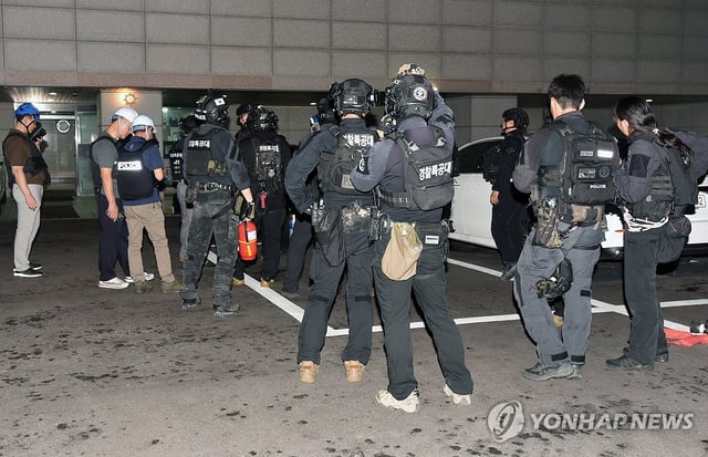 Police search the home of a man who shot his son to death in northern Seoul on July 21, 2025, in this photo provided by the Seoul Metropolitan Fire & Disaster Headquarters. (PHOTO NOT FOR SALE) (Yonhap)