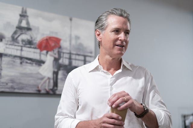 California Gov. Gavin Newsom holds a coffee on July 8, 2025 in Florence, South Carolina.