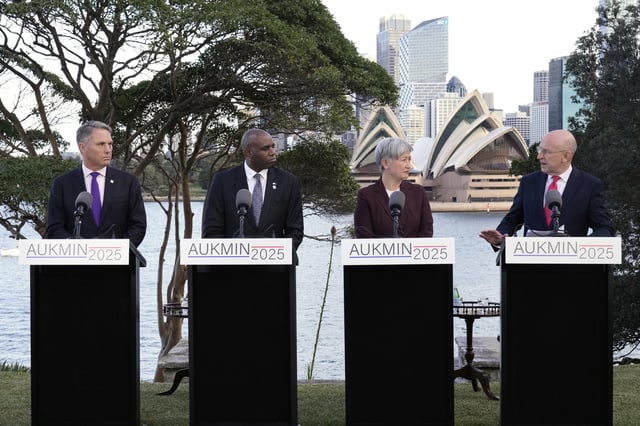 Australian Deputy Prime Minister Richard Marles, from left, Britain's Secretary of State for Foreign, Commonwealth and Development Affairs David Lammy, Australian Foreign Minister Penny Wong and Britain's Secretary of State for Defence John Healey hold a press conference at Admiralty House following the Australia-UK Ministerial Consultations (AUKMIN) in Sydney, Australia, Friday, July 25, 2025. (AP Photo/Rick Rycroft)