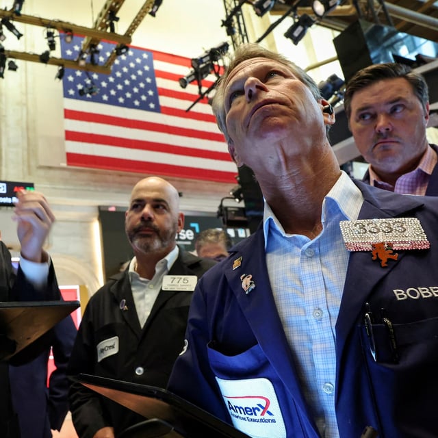 Traders wait for insurance marketplace Accelerant to begin trading during the company’s IPO at the New York Stock Exchange (NYSE) in New York City, U.S., July 24, 2025. REUTERS/Brendan McDermid