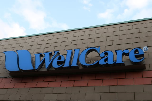 A sign for Wellcare, part of the Centene Corporation, is seen in Queens, New York, U.S., November 16, 2021. Picture taken November 16, 2021. REUTERS/Andrew Kelly