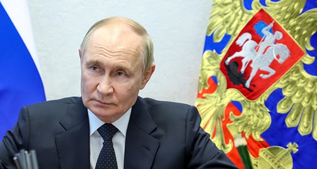 Russian President Vladimir Putin attends a meeting with VTB Bank President and Chairman of the United Shipbuilding Corporation Management Board Andrey Kostin and United Shipbuilding Corporation Director General Andrei Puchkov, in Severodvinsk, Arkhangelsk region, Russia July 24, 2025. Sputnik/Alexander Kazakov/Pool via REUTERS/File Photo