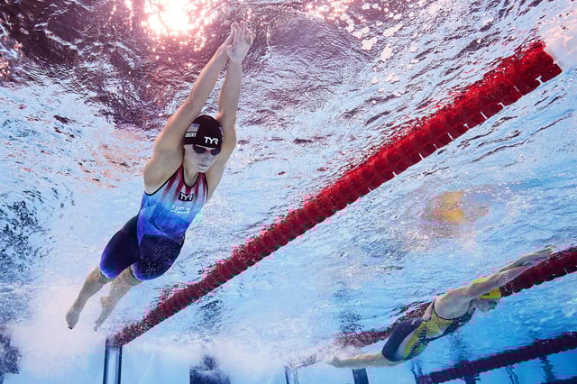 NANTERRE, FRANCE - AUGUST 03: (EDITORS NOTE: Image was captured using an underwater robotic camera.) Katie Ledecky of Team United States and Ariarne Titmus of Team Australia compete in the Women's 800m Freestyle Final on day eight of the Olympic Games Paris 2024 at Paris La Defense Arena on August 03, 2024 in Nanterre, France. (Photo by Maddie Meyer/Getty Images)