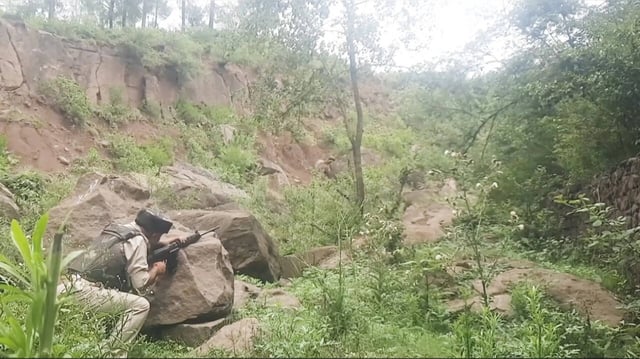 **EDS: SCREENSHOT VIA PTI VIDEOS** Udhampur: A security personnel during a searc...