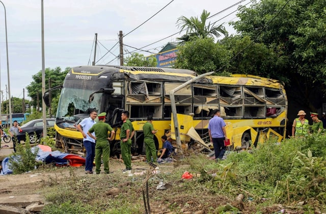 An overnight sleeper bus crashed in Vietnam on Friday, killing 10 people, including two children, and injuring 12