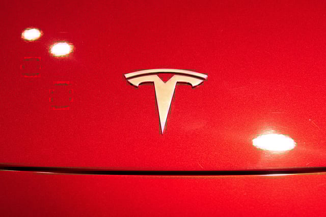 BANGKOK, THAILAND - 2024/06/30: A Tesla logo seen on a Tesla Model 3 car during the event at Central World the shopping mall. (Photo by Peerapon Boonyakiat/SOPA Images/LightRocket via Getty Images)