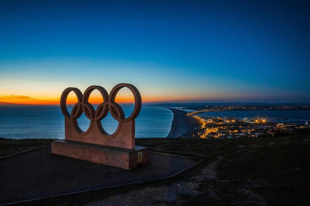olympic rings at sunset