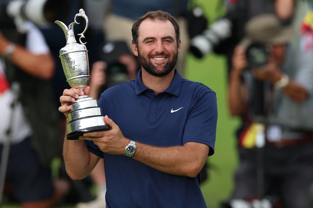 PORTRUSH, NORTHERN IRELAND - JULY 20: Scottie Scheffler of the United States poses with the Claret Jug on the 18th green after winning The 153rd Open Championship at Royal Portrush Golf Club on July 20, 2025 in Portrush, Northern Ireland. (Photo by Richard Heathcote/Getty Images)