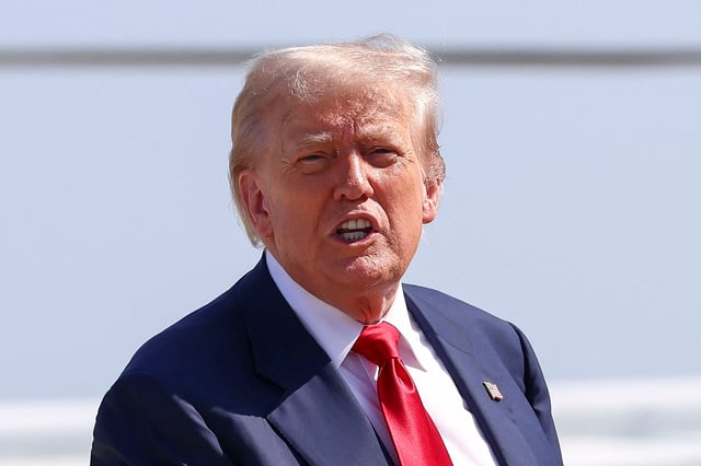 U.S. President Donald Trump speaks after disembarking Marine One, as he departs for Scotland, at Joint Base Andrews, Maryland, U.S., July 25, 2025. REUTERS/Evelyn Hockstein