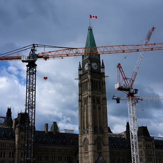 The federal government posted a $6.5 billion deficit in the first two months of the fiscal year. The Peace Tower on Parliament Hill in Ottawa is seen past construction cranes, ahead of Parliament's Monday return on Sunday, May 25, 2025. THE CANADIAN PRESS/Justin Tang