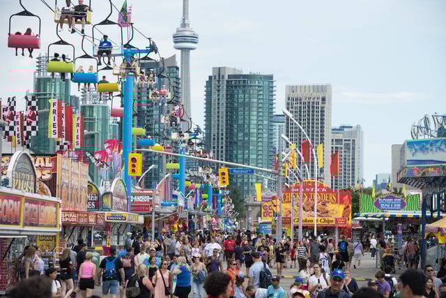 This summer, one lucky couple will say "I do" on the CNE Midway, complete with rides, cake, and a VIP concert experience from 98 Degrees.