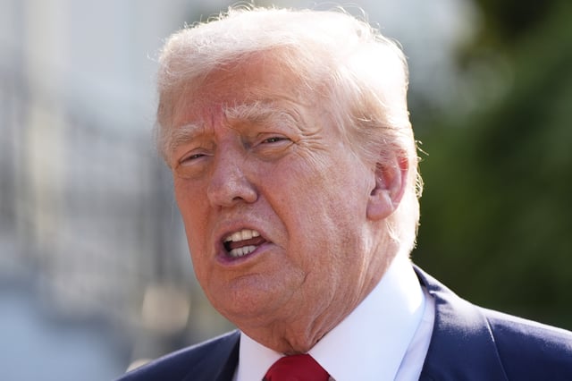 President Donald Trump speaks with reporters before departing on Marine One from the South Lawn of the White House, Friday, July 25, 2025, in Washington. The president is travelling to Scotland.