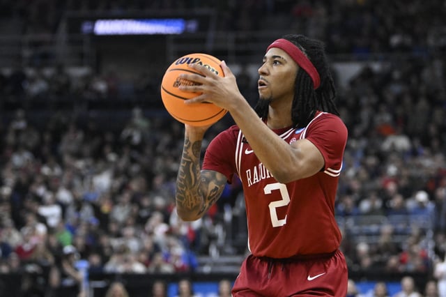 Mar 20, 2025; Providence, RI, USA;  Arkansas Razorbacks guard Boogie Fland (2) controls the ball during the second half against the Kansas Jayhawks at Amica Mutual Pavilion. Mandatory Credit: Eric Canha-Imagn Images/ File Photo