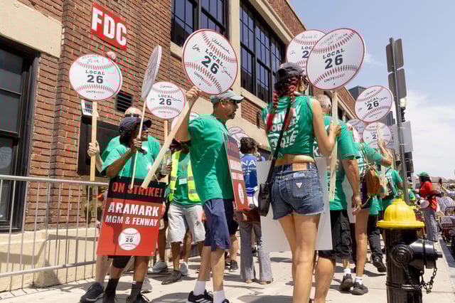 Concession workers outside Fenway Park ahead of a Red Sox baseball game in Boston, on Friday, July 25, 2025.