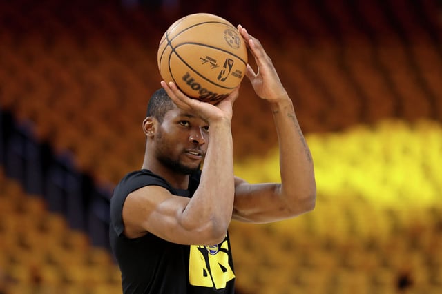 Jonathan Kuminga of the Golden State Warriors warms up before the playoff game against the Minnesota Timberwolves at Chase Center on May 12, 2025, in San Francisco.