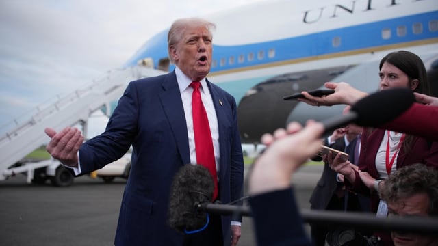 Donald Trump speaks to the media as he arrives at Prestwick airport