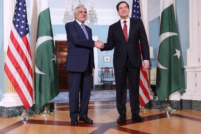 U.S. Secretary of State Marco Rubio and Pakistani Deputy Prime Minister and Foreign Minister Ishaq Dar shake hands for photographers assembled at the State Department in Washington, D.C., U.S., July 25, 2025. REUTERS/Jonathan Ernst